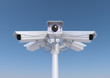 3d render of 6 security cameras on a pole close up.
