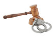 Gavel and handcuffs isolated on white