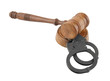 Gavel and handcuffs isolated on white