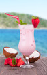 Summer drink with blur beach on background 