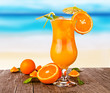 Summer drink with blur beach on background 
