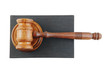 Judge's gavel and legal book isolated on white