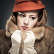 Vintage Woman Clutching Her Faux Fur Coat
