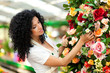 Female florist in a greenhouse