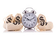 Photo: Sacks of money and alarm clock on white Sacks of money and alarm clock on white