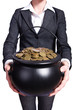 Woman holding pot of gold coins