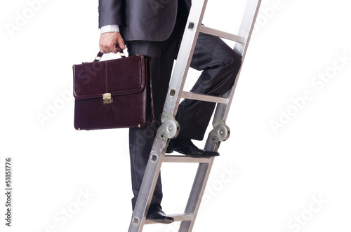Photo: Businessman climbing the ladder isolated on white Businessman climbing the ladder isolated on white