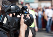 Photo: covering an event with a video camera covering an event with a video camera