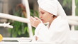 Video: Woman drinks morning coffee after shower slowmotion scene Woman drinks morning coffee after shower slowmotion scene