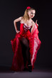 Girl in red dress dancing dance
