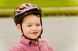 Photo: Young boy wearing safety helmet for bike riding Young boy wearing safety helmet for bike riding