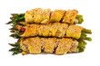 bunch of asparagus rolled with  puff pastry and speck