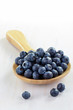Blueberries in wooden spoon