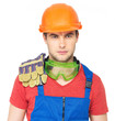 Photo: portrait of serious worker in uniform portrait of serious worker in uniform