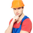 Photo: portrait of thinking handyman in uniform portrait of thinking handyman in uniform