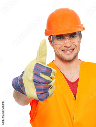 Photo: Portrait of craftsman with thumbs up sign Portrait of craftsman with thumbs up sign