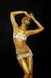 Body Art. Coloring. Woman with Art Gold Makeup. Golden Statue