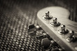 Electrical guitar headstock closeup. Sepia effect with vignette