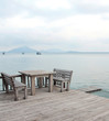 table and chairs on a tropical beach resort