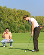 Foto: Zwei junge Golfspieler Zwei junge Golfspieler