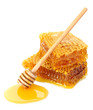 sweet honeycomb and wooden drizzler, isolated on white