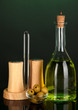 Original glass bottle with oil on dark color background