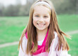 Photo: portrait of a happy liitle girl portrait of a happy liitle girl