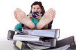 Office woman puts feet up relaxing