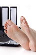 Bare feet on the desk
