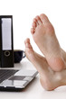 Bare feet on the desk
