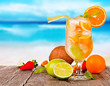 Summer drink with blur beach on background 