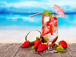 Summer drink with blur beach on background 