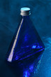 Little blue bottle on a background