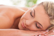 Beautiful woman lying in a spa