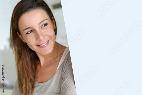Photo: Smiling woman with happy look on her face Smiling woman with happy look on her face