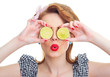Woman covered her eyes with lemon