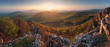 Sunset mountain panorama with sun