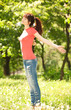 Photo: Fashion woman relaxing in the park Fashion woman relaxing in the park