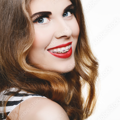 Beautiful woman smiling with braces