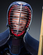 Portrait of kendoka with shinai