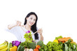 Beautiful woman makes salad on white