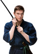 Kendo fighter in hakama training with bokken