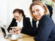 Business people are in a meeting and take the minutes