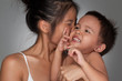 Mother Kissing Her Son
