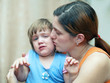 woman calms daughter