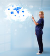 Young doctor with abstract cloud and medical icons