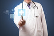 Doctor pressing modern medical type of button