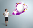 Attractive woman presenting abstract speech bubble copy space