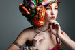 Photo of beautiful girl in a head-dress from the coloured fabric