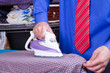 Businessman Ironing Clothes